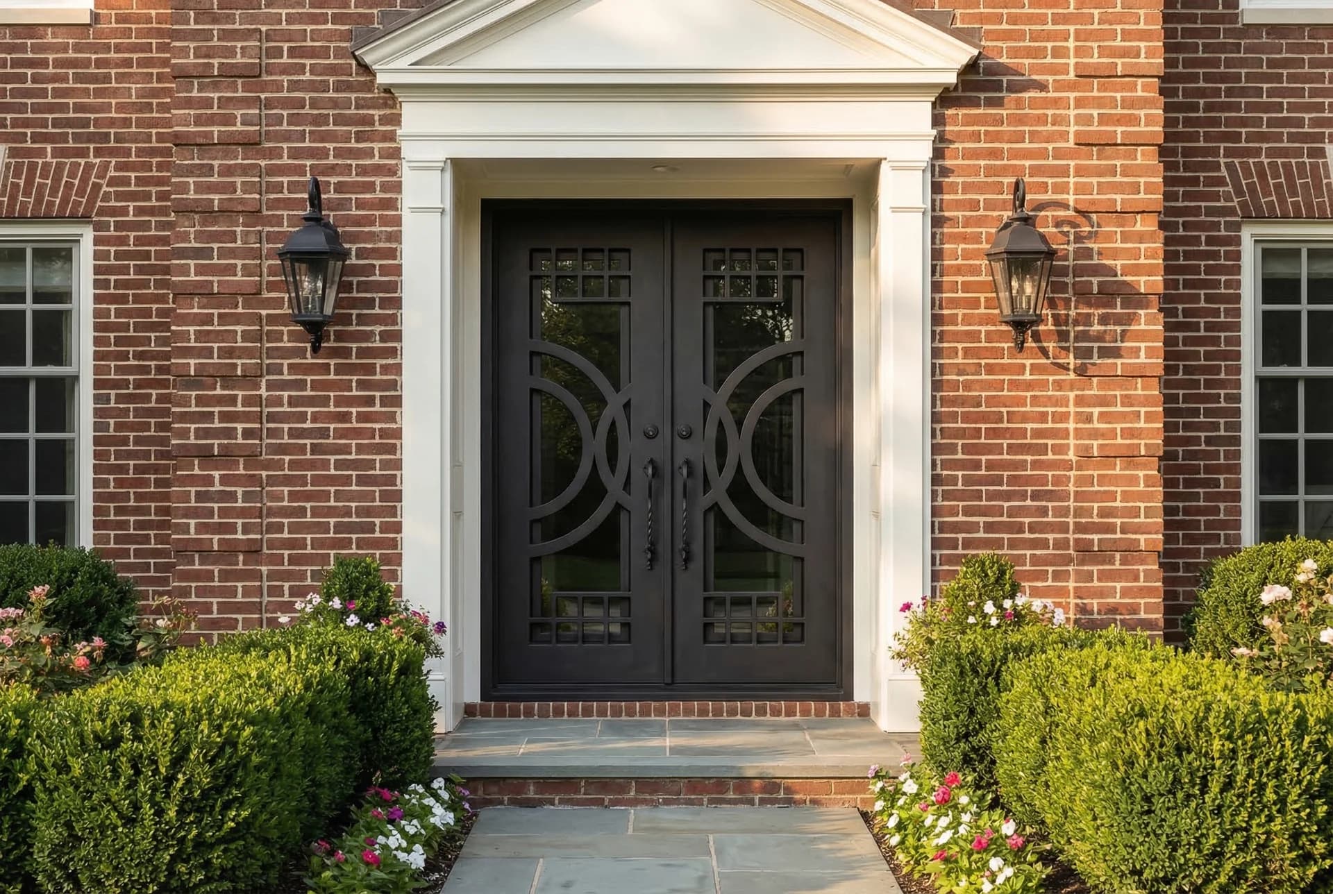 Straight top iron door in brick traditional home